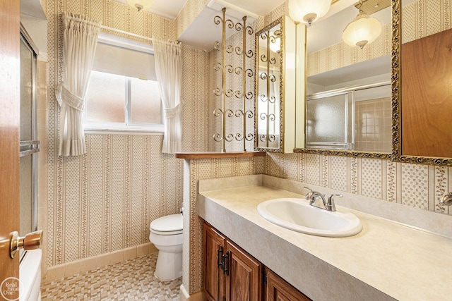 bathroom featuring vanity, decorative backsplash, a shower with door, toilet, and wallpapered walls