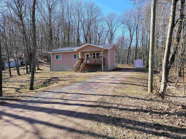 131 Midway Dr, Negaunee, MI 49866 - view of front of property with covered porch and stairs