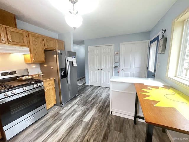 131 Midway Dr, Negaunee, MI 49866 - kitchen featuring appliances with stainless steel finishes, under cabinet range hood, dark wood-type flooring, light countertops, and baseboards