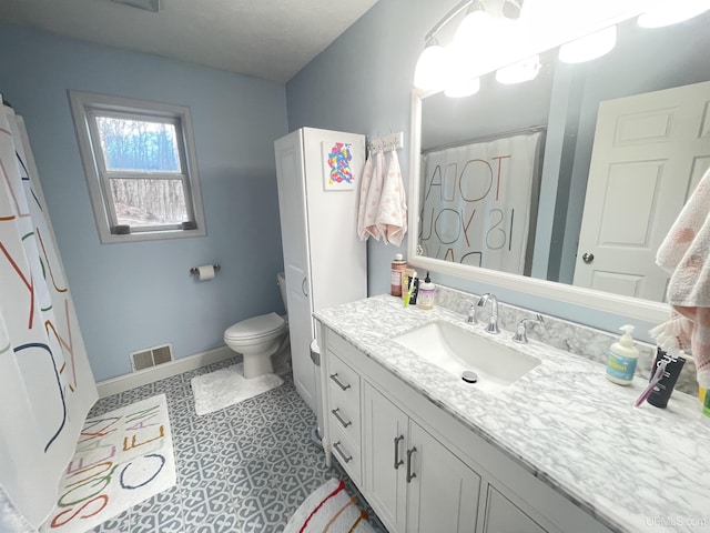 131 Midway Dr, Negaunee, MI 49866 - bathroom with vanity, toilet, baseboards, and a shower with curtain