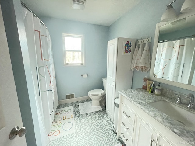 131 Midway Dr, Negaunee, MI 49866 - full bathroom featuring vanity, toilet, and baseboards