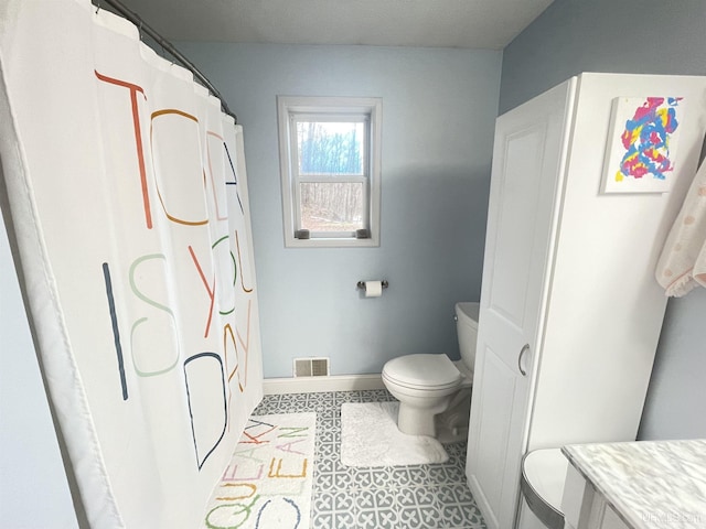 131 Midway Dr, Negaunee, MI 49866 - bathroom featuring toilet, baseboards, vanity, and curtained shower