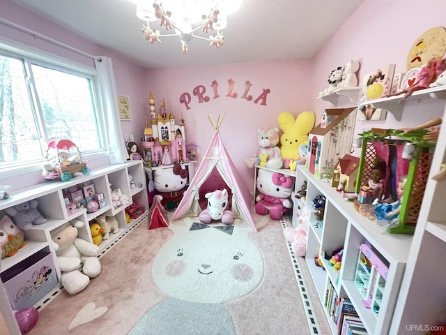 131 Midway Dr, Negaunee, MI 49866 - playroom with a chandelier
