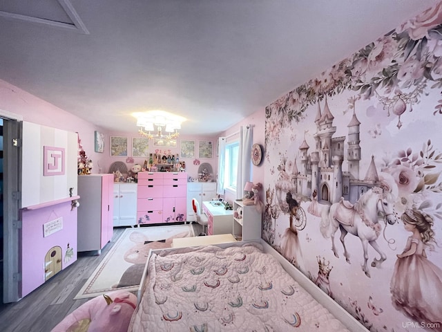 131 Midway Dr, Negaunee, MI 49866 - bedroom featuring wood finished floors and a chandelier