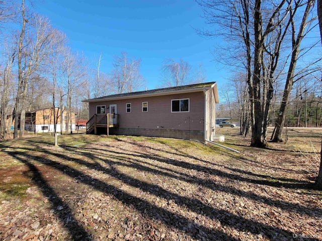 131 Midway Dr, Negaunee, MI 49866 - back of property featuring a wooden deck