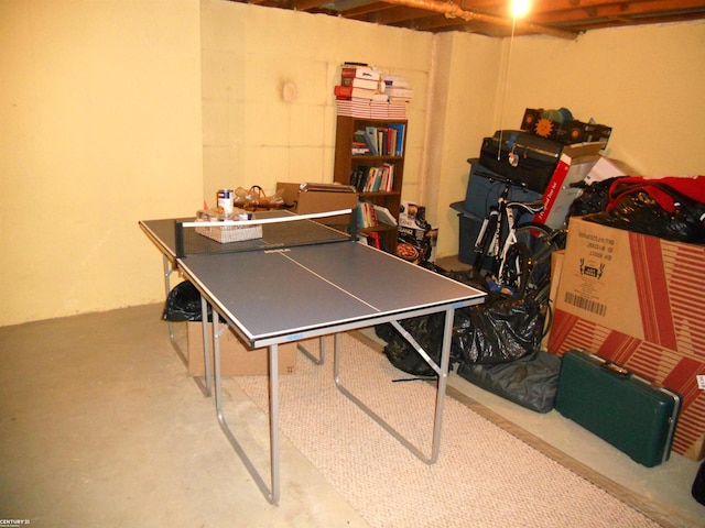 game room featuring concrete flooring