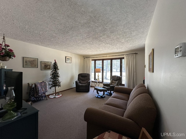 living room with carpet flooring and a textured ceiling