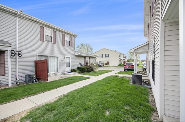 view of yard with central AC