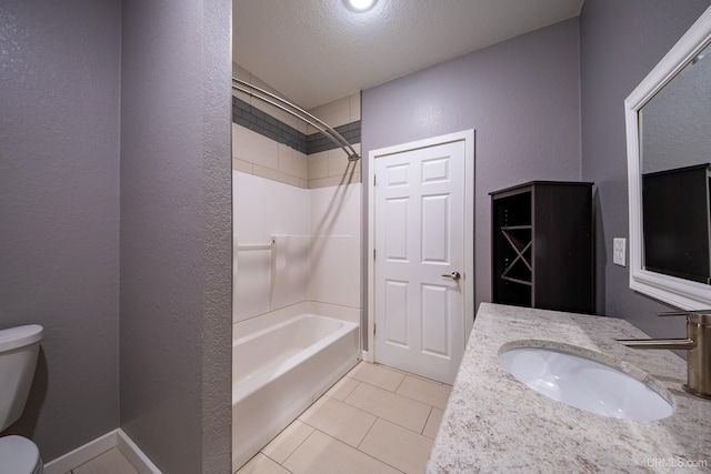 bathroom with a textured wall, toilet, a textured ceiling, tile patterned floors, and  shower combination