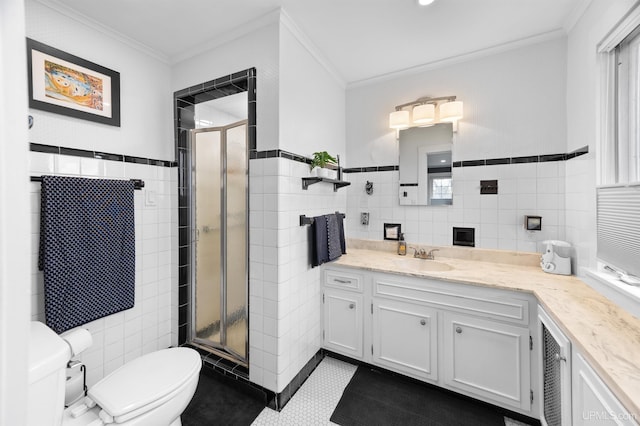 full bath featuring crown molding, tile walls, a shower stall, and toilet