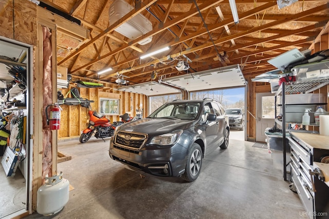 garage featuring a garage door opener