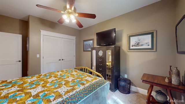 N9006 Sand River Rd, Deerton, MI 49822 - bedroom with a closet, baseboards, and a ceiling fan