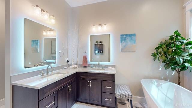 N9006 Sand River Rd, Deerton, MI 49822 - bathroom with a freestanding bath, a sink, and double vanity