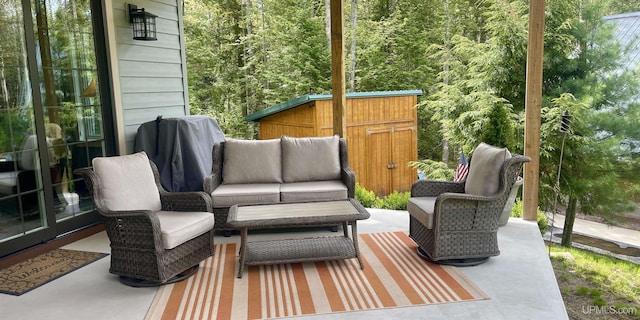 N9006 Sand River Rd, Deerton, MI 49822 - view of patio / terrace with an outdoor living space and a forest view