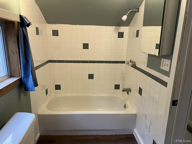 bathroom featuring toilet and wood finished floors