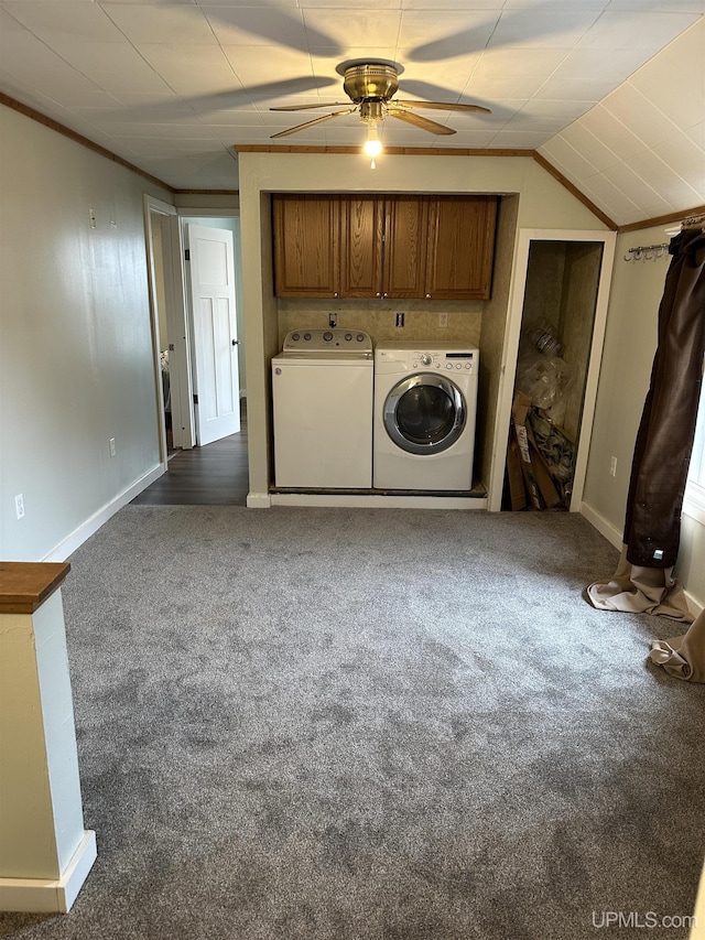 laundry area with cabinet space, ceiling fan, washing machine and dryer, baseboards, and dark carpet