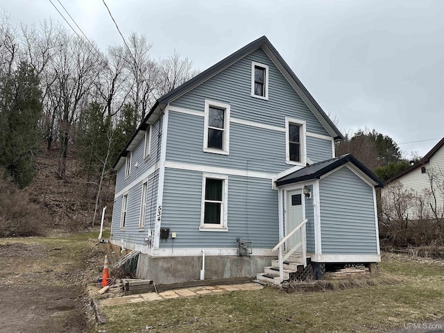 view of front of property with entry steps