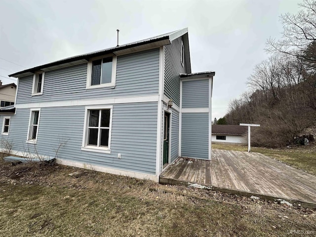 rear view of house with a deck