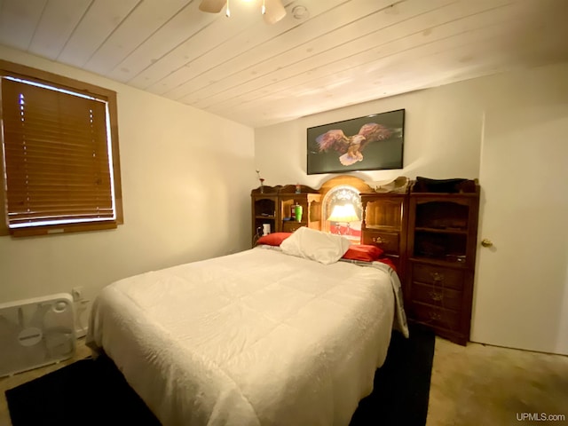 bedroom with carpet and wooden ceiling