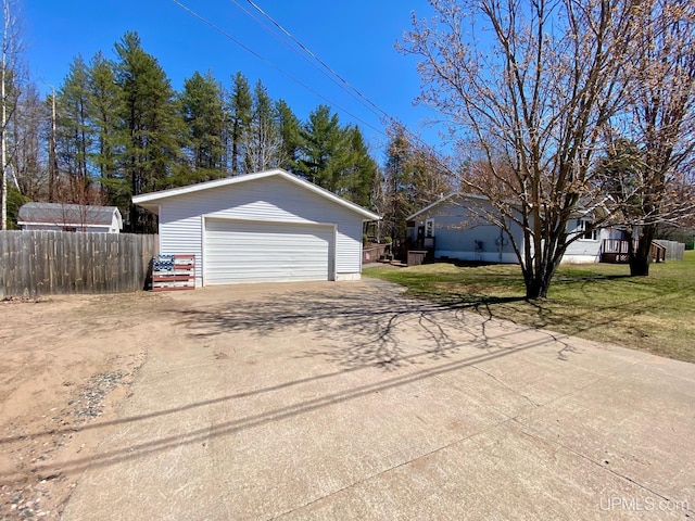 detached garage with fence