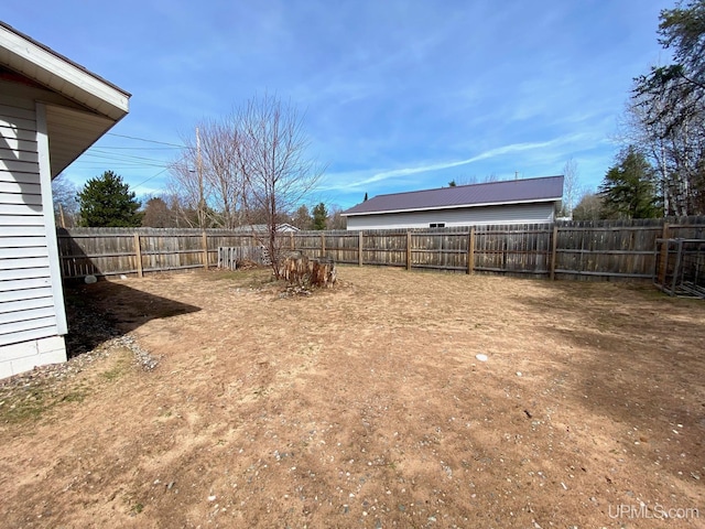 view of yard featuring a fenced backyard