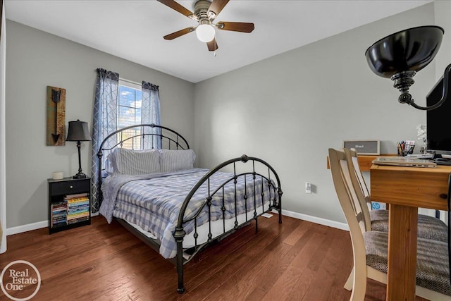 bedroom with baseboards, a ceiling fan, and wood finished floors