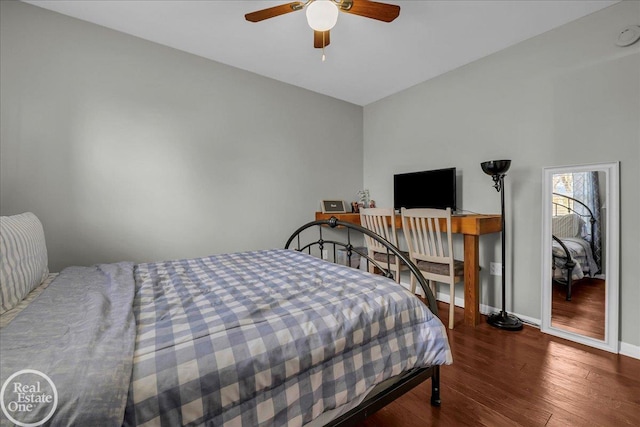 bedroom with baseboards, a ceiling fan, and wood finished floors