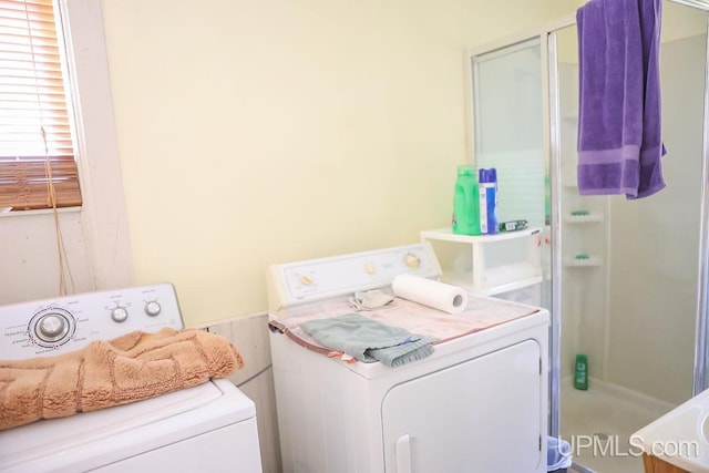laundry area featuring laundry area and washing machine and dryer