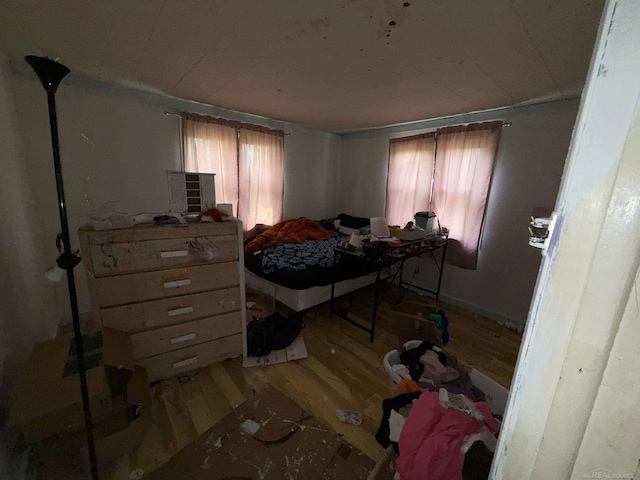bedroom with light wood-style floors