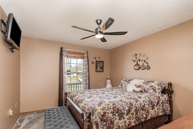 bedroom featuring ceiling fan, carpet floors, baseboards, and access to exterior