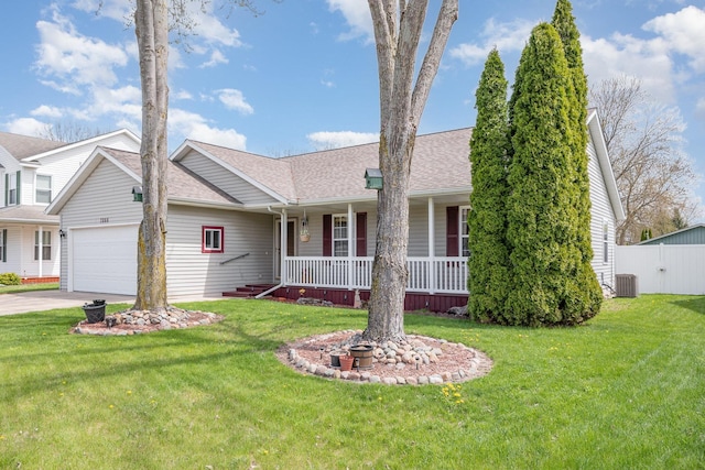 single story home with covered porch, roof with shingles, a garage, and a front lawn