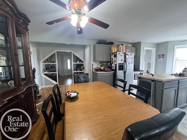 dining area with a ceiling fan