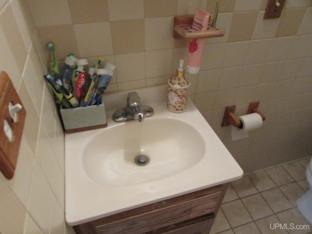 25485 Opal Rd, Watton, MI 49970 - bathroom with vanity, tile patterned floors, and tile walls