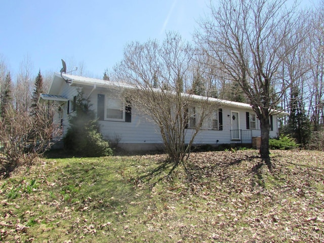 25485 Opal Rd, Watton, MI 49970 - ranch-style house featuring a metal roof