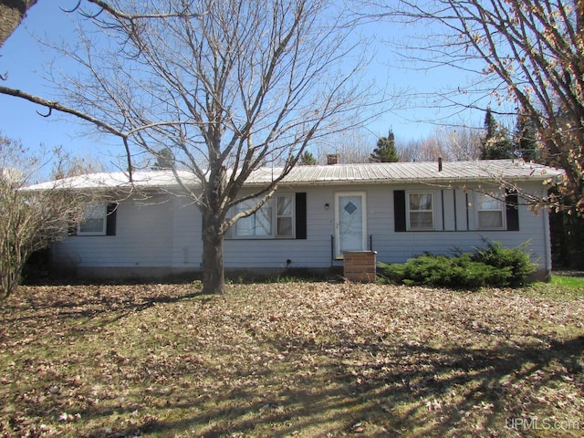 25485 Opal Rd, Watton, MI 49970 - single story home with a metal roof