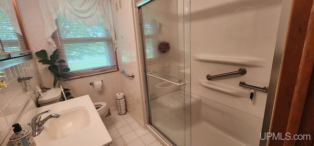 25485 Opal Rd, Watton, MI 49970 - bathroom with a stall shower, tile patterned floors, and tile walls