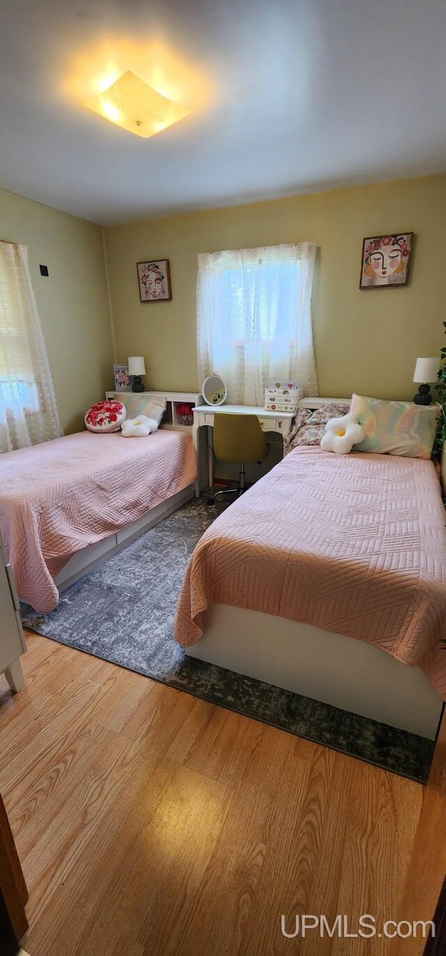 25485 Opal Rd, Watton, MI 49970 - bedroom with wood finished floors