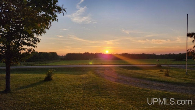 25485 Opal Rd, Watton, MI 49970 - surrounding community featuring driveway and a yard