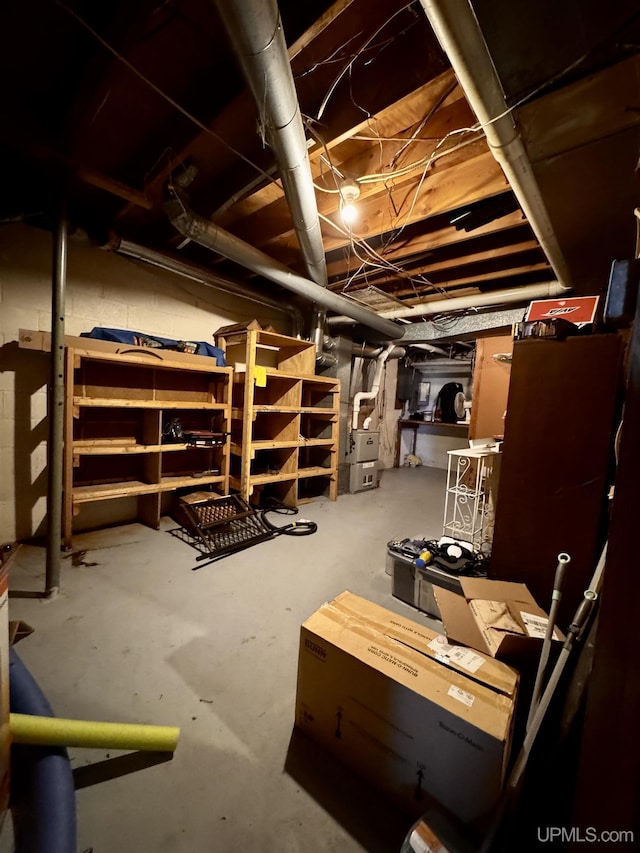 unfinished basement with heating unit
