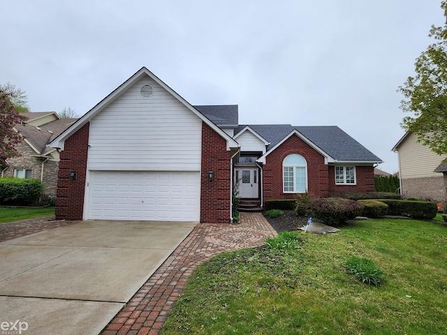 view of front of home with concrete driveway, a front yard, brick siding, and a garage