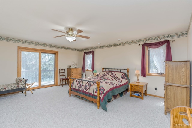 bedroom with baseboards, ceiling fan, carpet floors, and access to exterior