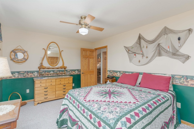 bedroom with a ceiling fan and carpet floors