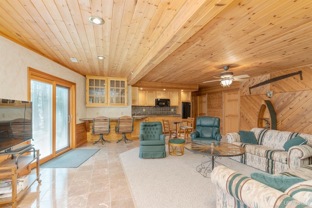 living room featuring a ceiling fan, wood walls, recessed lighting, and wooden ceiling