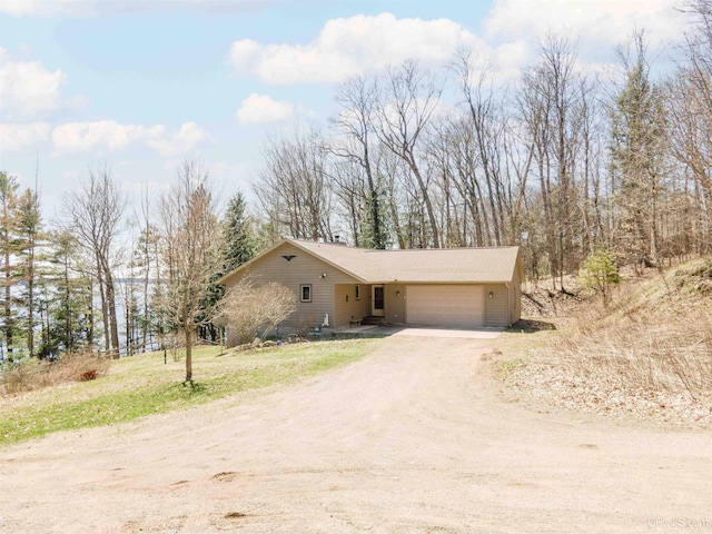 view of front of home with an attached garage and driveway