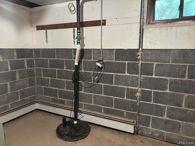 detailed view of concrete block wall and unfinished concrete floors