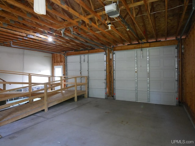 garage featuring a garage door opener
