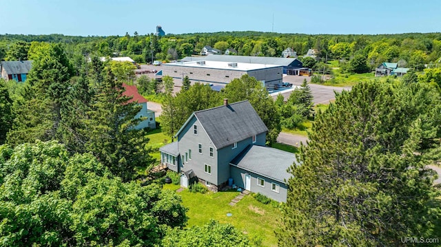 drone / aerial view with a forest view
