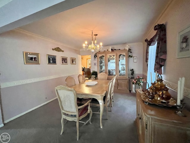 dining space with a notable chandelier, crown molding, and carpet floors