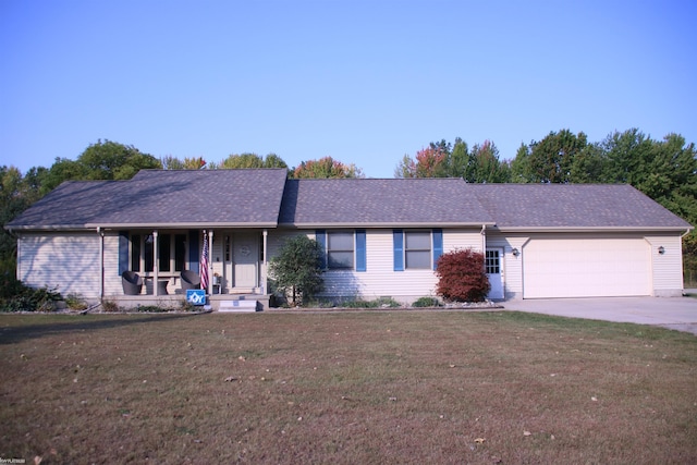 ranch-style home featuring driveway, covered porch, a garage, a shingled roof, and a front yard