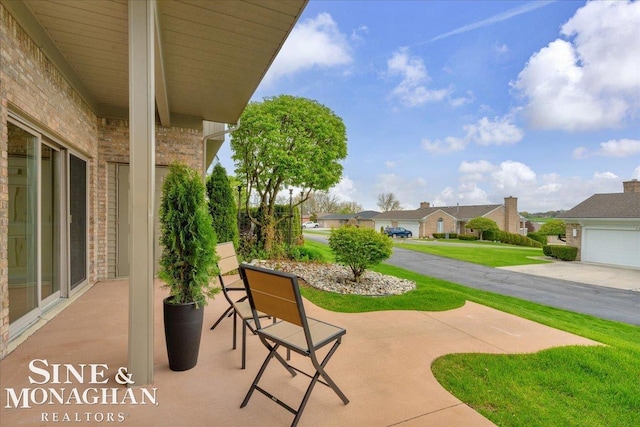 view of patio featuring a residential view